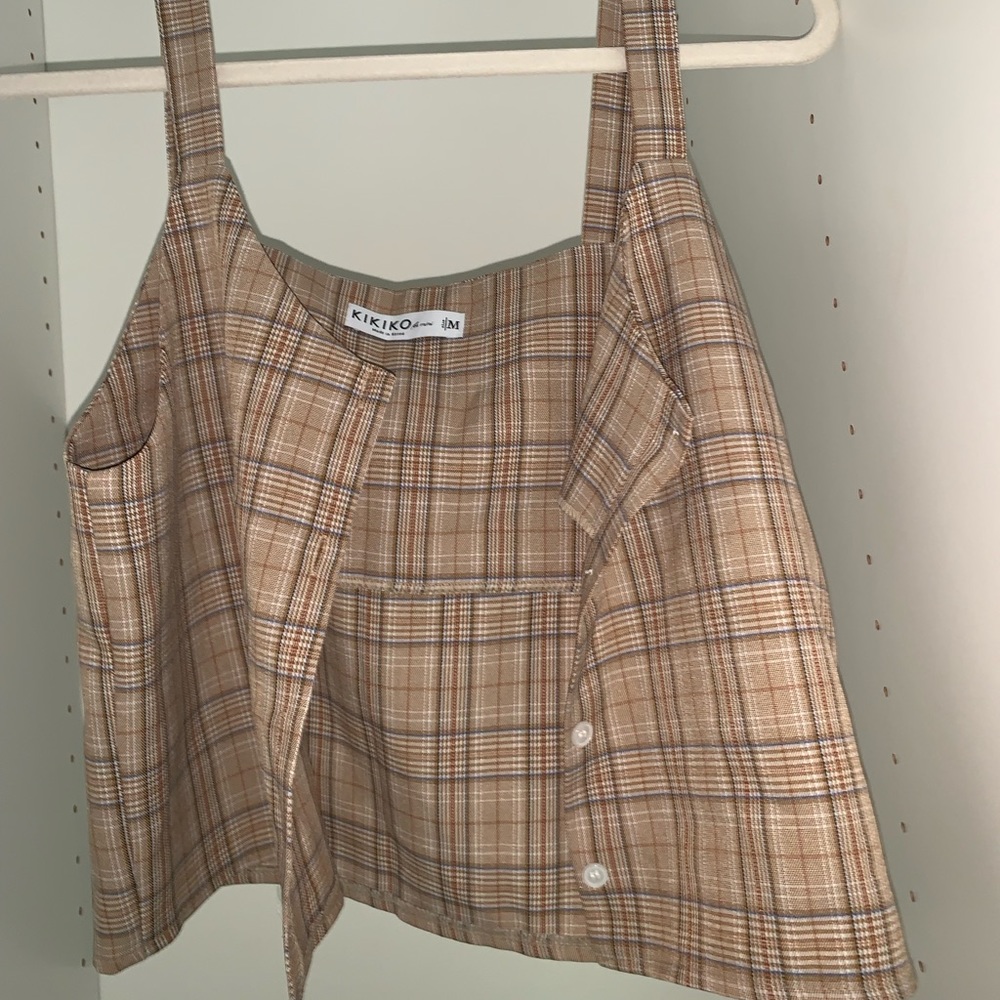 Brown KIKIKO top. Very cute and can be formal.
